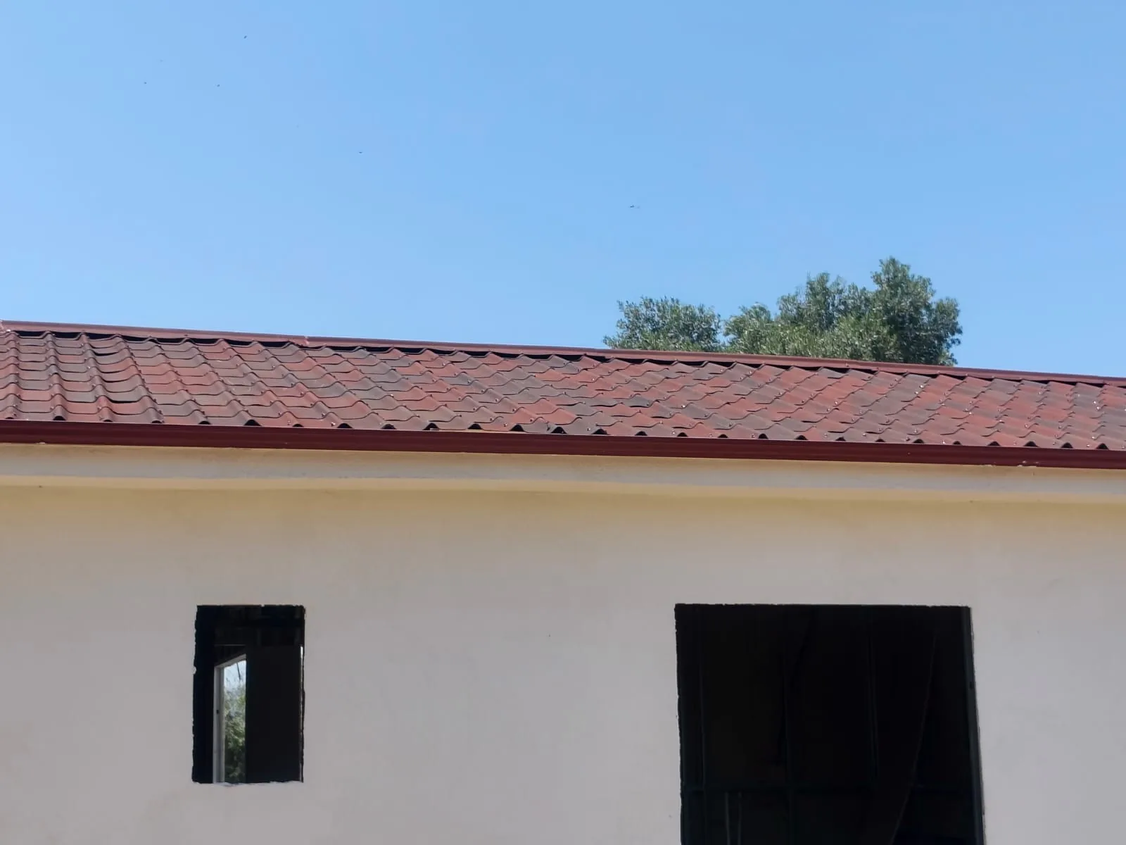 Kiremit çatı ve sıvalı dış cephe detayı